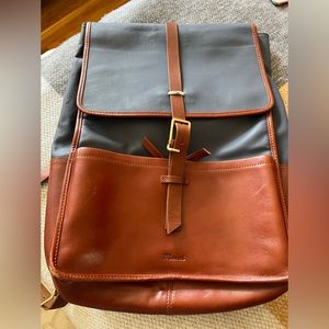 Miansai backpack. Has some wear on corner leather. Brass harder.